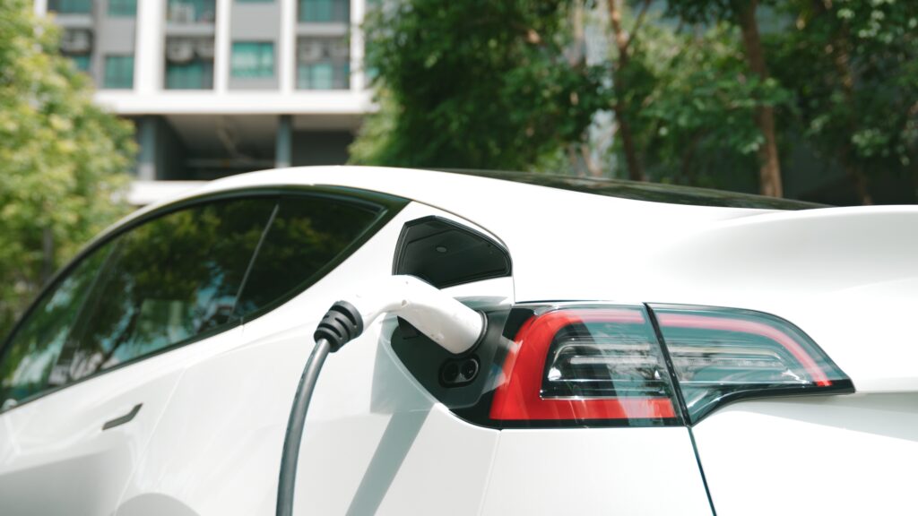 ev,electric,car,charging,in,green,sustainable,city,outdoor,garden